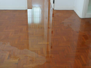 Water,Spreading,/,Flooding,On,The,Parquet,Floor,Water,Damage,Contractor,Near,Me